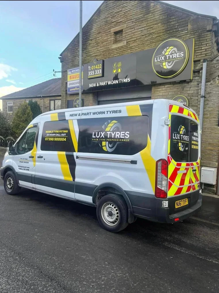 Lux Tyres van parked outside the shop in Halifax - serving York